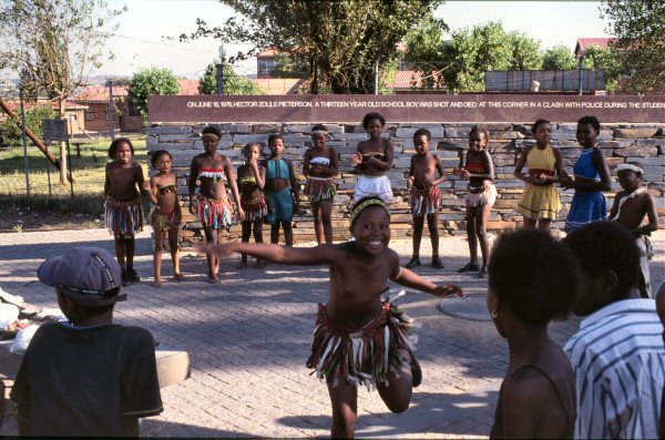 Dancing children in the street.